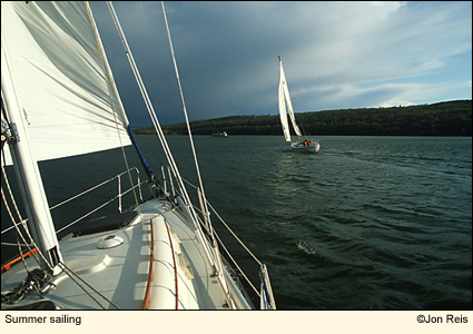Summer sailing in the Finger Lakes, New York USA. Photo by Jon Reis.
