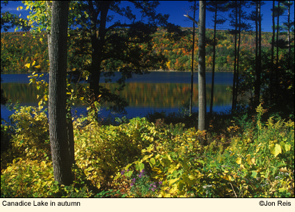 An autumn scene on Canadice Lake in the Finger Lakes, New York USA. Photo by Ithaca, New York photographer Jon Reis.