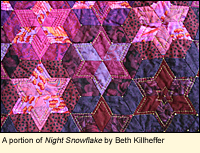 A portion of the quilt Night Snowflake by Beth Killheffer