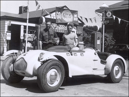 Race car driver Cameron Argetsinger with Lester Smalley at Smalley's garage in Watkins Glen, NY in 1951.