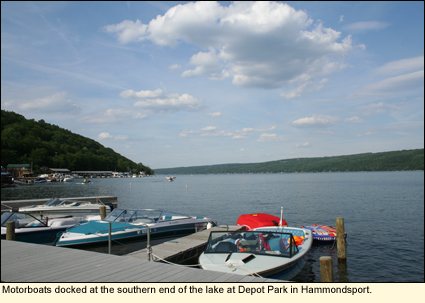 Motorboats docked at Depot Park at the southern end of Keuka Lake in the Finger Lakes, New York USA.