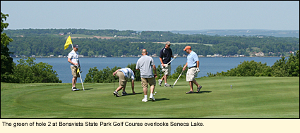 The green of hole 2 at Bonavista State Park Golf Course overlooks Seneca Lake.