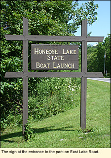The sign at the entrance to Honeoye Lake Boat Launch State Park on East lake Road in the Finger Lakes region of New York.