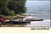 Boat being launched at Honeoye Lake Boat Launch State Park in Ontario County in the Finger Lakes Region, New York USA.