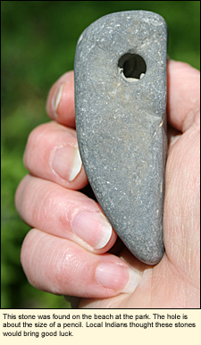 This stone was found on the beach at Lodi Point State marine Park. The hole is about the size of a pencil. Local Indians thought these stones would bring good luck.