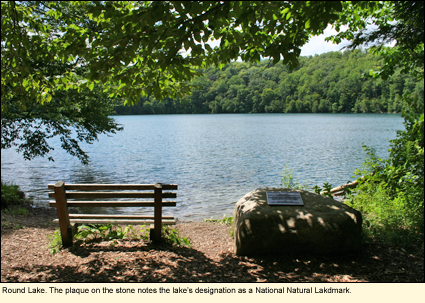 Round Lake at Green Lake State Park. The plaque on the stone notes the lake's designation as a National Natural Landmark.