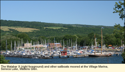 The Malabar X sailboat and other sailboats moored at the Village Marina on Seneca Lake in Watkins Glen, New York.