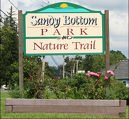 The entrance sign to the Sandy Bottom Park and Nature Trail in the Town of Richmond in Ontario County.