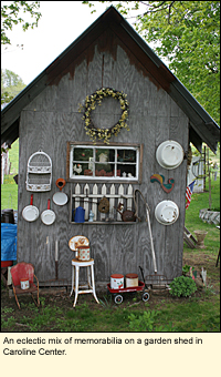 An eclectic mix of memorabilia on a garden shed in Caroline Center, New York, USA.