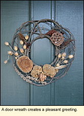 A door wreath creates a pleasant greeting in the Village of Trumansburg in the Finger Lakes Region of New York State.