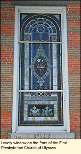 Lovely window on the front of the First Presbyterian Church of Ulysses in the Village of Trumansburg in the Finger Lakes Region of New York State.