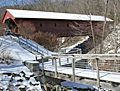 The Newfield Covered Bridge in Newfield, New York was built in 1853 and is the oldest covered bridge still in use in the state.