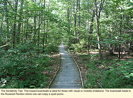 The Sensitivity Trail at Spencer Crest Nature Center, Corning, New York. This looped boardwalk is ideal for those with visual or mobility limitations. The boardwalk leads to the Rockwell Pavilion where one can enjoy a quiet picnic.