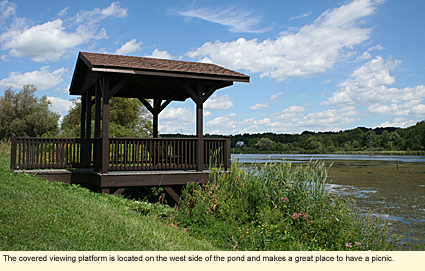 The covered viewing platform is located on the west side of the pond and makes a great place to have a picnic.