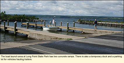 The boat launch area at Long Point State Park has two concrete ramps. There is also a temporary dock and a parking lot for vehicles hauling trailers.