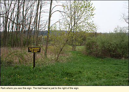 Park where you see this sign. The trail head is just to the right of the sign.
