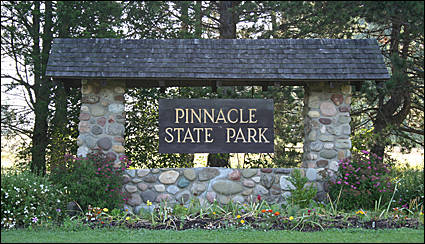 Sign at the entrance to Pinnacle State Park in Addison, New York.