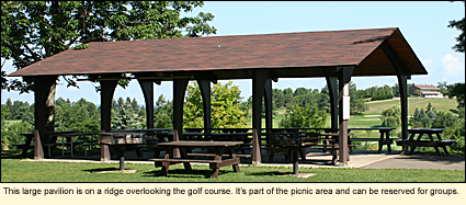 This large pavilion is on a ridge overlooking the golf course. it's park of the picnic area and can be reserved for groups.