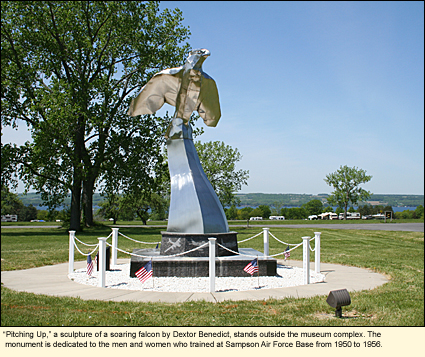 "Pitching Up," a sculpture of a soaring falcon by Dextor Benedict, stands outside the museum complex. The monument is dedicated to the men and women who trained at Sampson Air Force base from 1950 to 1956.