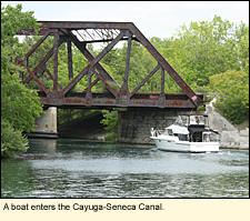 A boat enters the Cayuga-Seneca Canal.