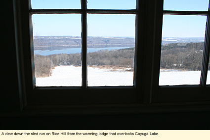 A view down the sled run on Rice Hill (part of Taughannock Falls State Park) from the warming lodge that overlooks Cayuga Lake.
