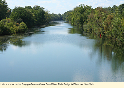 Late summer on the Cayuga-Seneca Canal from Water Falls Bridge in Waterloo, New York.
